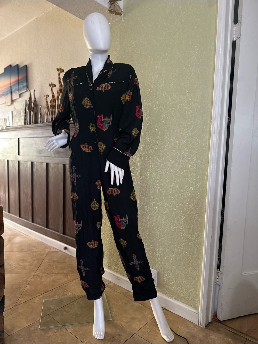 Black Printed Jumpsuit with Crest and Crown Motifs